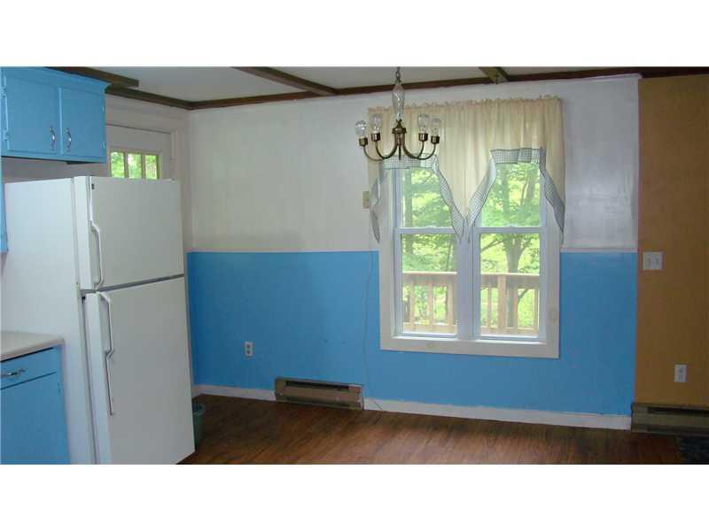 5 Forest Hill Road Temple, ME 04984 - Photo 6 of 16 Kitchen. Dining area with easy-care...