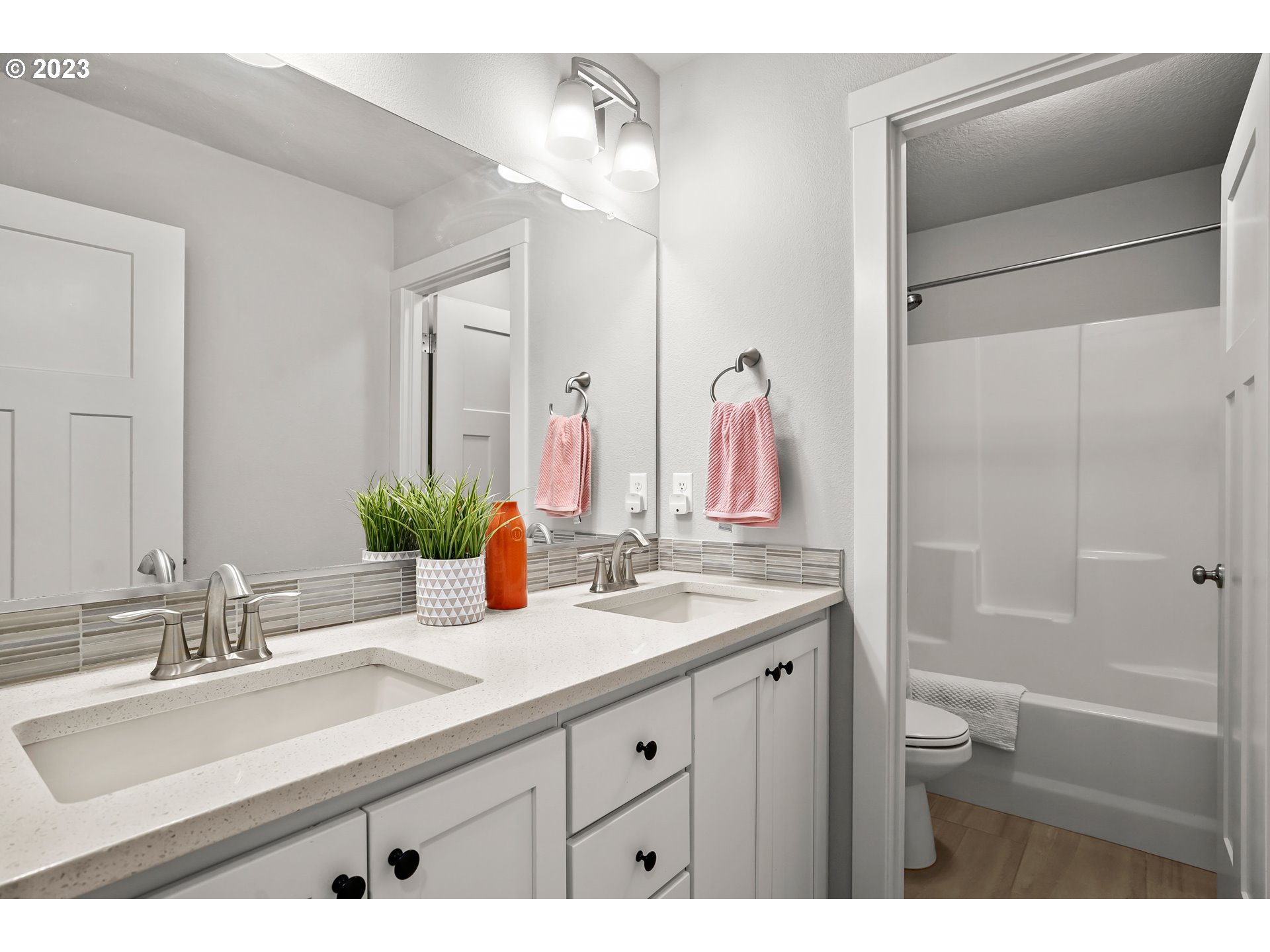 4189 Southwest Rodlun Road Gresham, OR 97080 - Photo 29 of 36 a bathroom with a double vanity sink mirror and shower