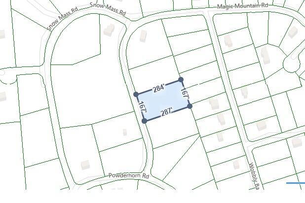 a picture of white walls with a window