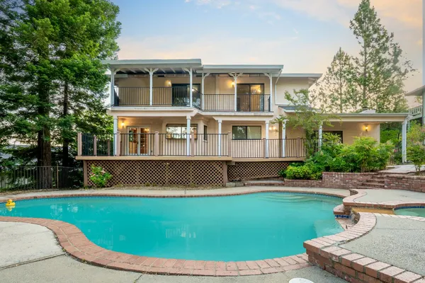 a view of a house with a swimming pool