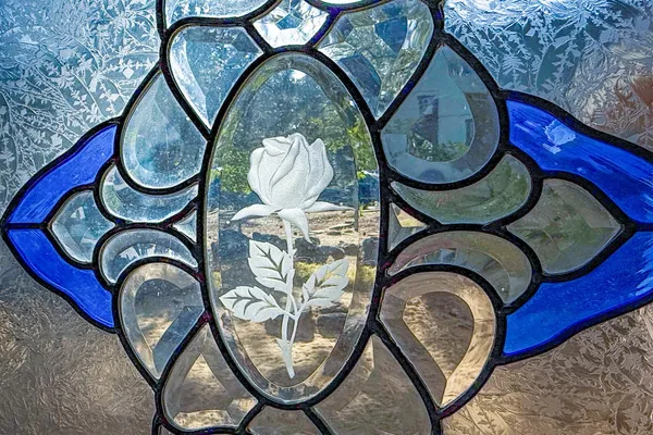 an empty room with a cabinet and mirrors