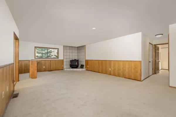 a view of kitchen with furniture and large window