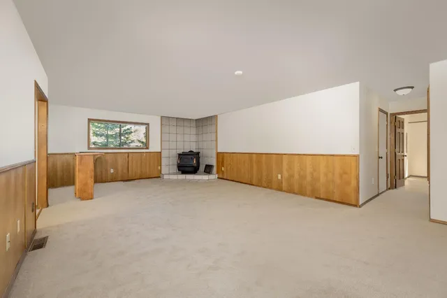 a view of kitchen with furniture and large window