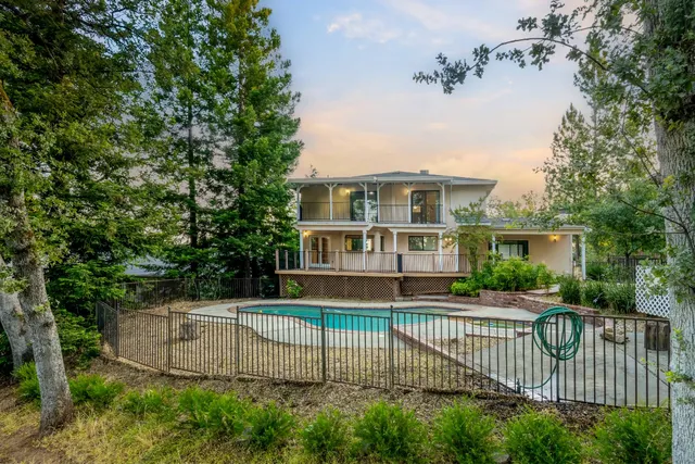 a view of an empty room with windows
