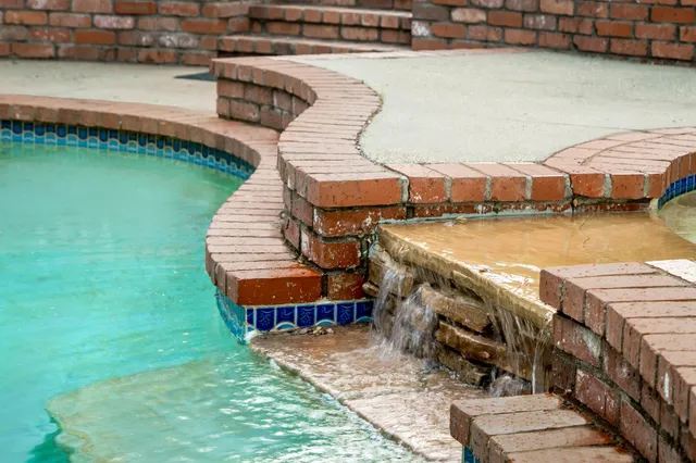 a spacious bathroom with a large tub sink and vanity