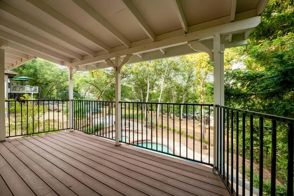 a view of a swimming pool with a patio