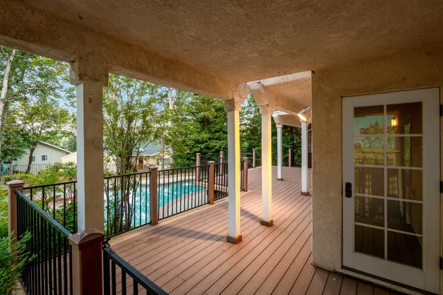 a view of an empty room with a fireplace