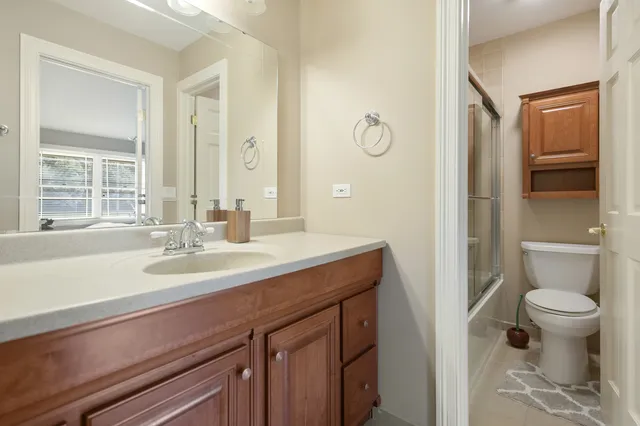 a view of staircase with a rug