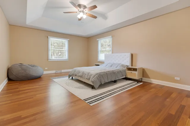 a bathroom with a sink a mirror a toilet and bathtub