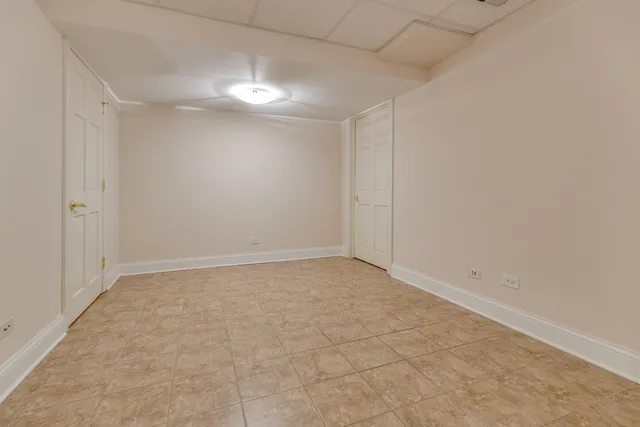 a bathroom with a sink a mirror and a shower