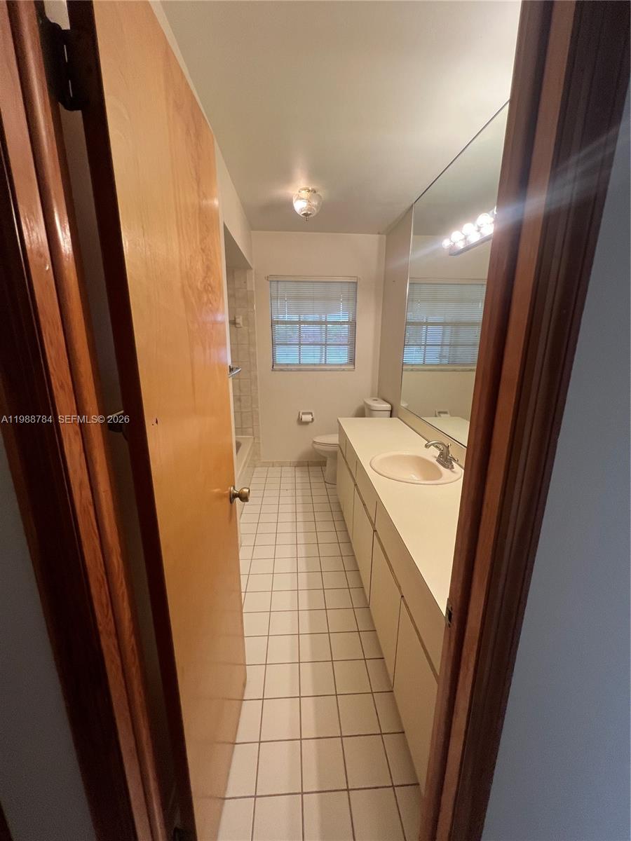 1652 Egret Road Homestead, FL 33035 - Photo 10 of 12 HALL BATHROOM WITH TUB AND SHOWER