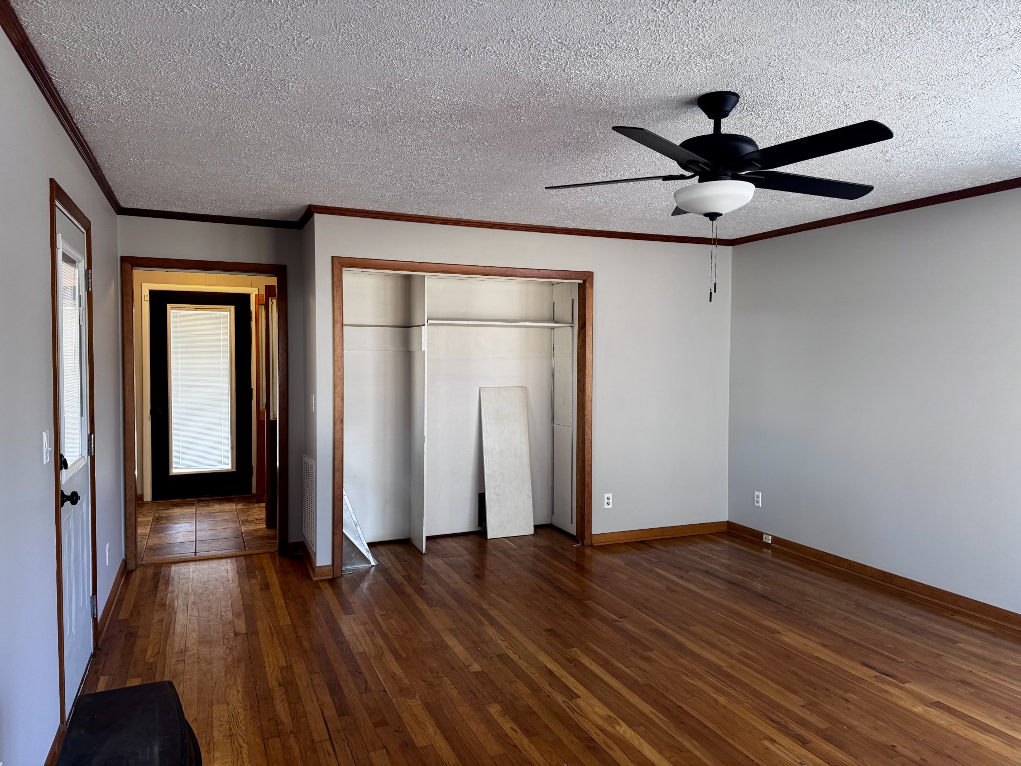 211 Church Street Loretto, TN 38469 - Photo 15 of 37 a view of empty room with wooden floor and fan
