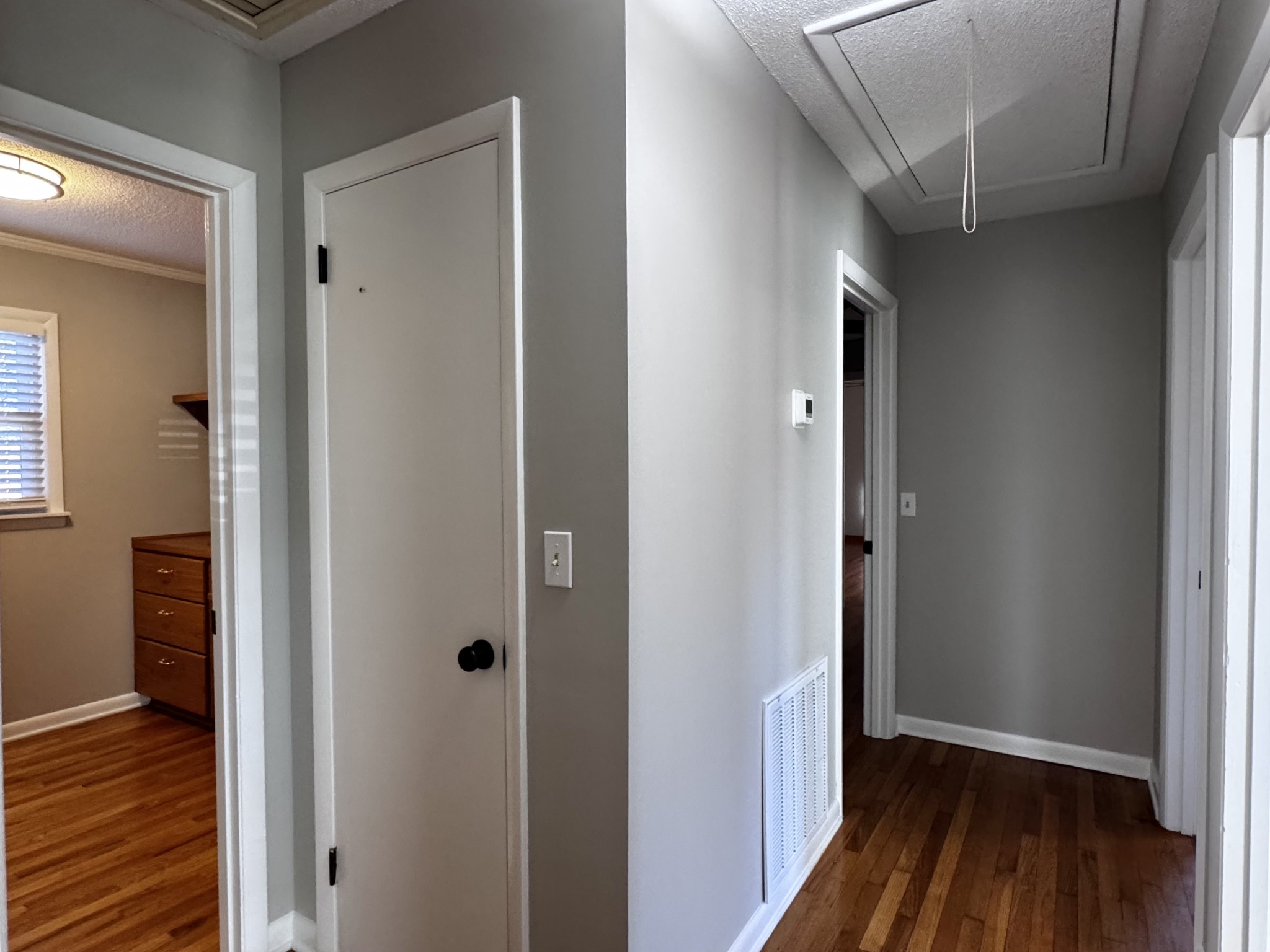 211 Church Street Loretto, TN 38469 - Photo 19 of 37 a view of a hallway with wooden floor and closet