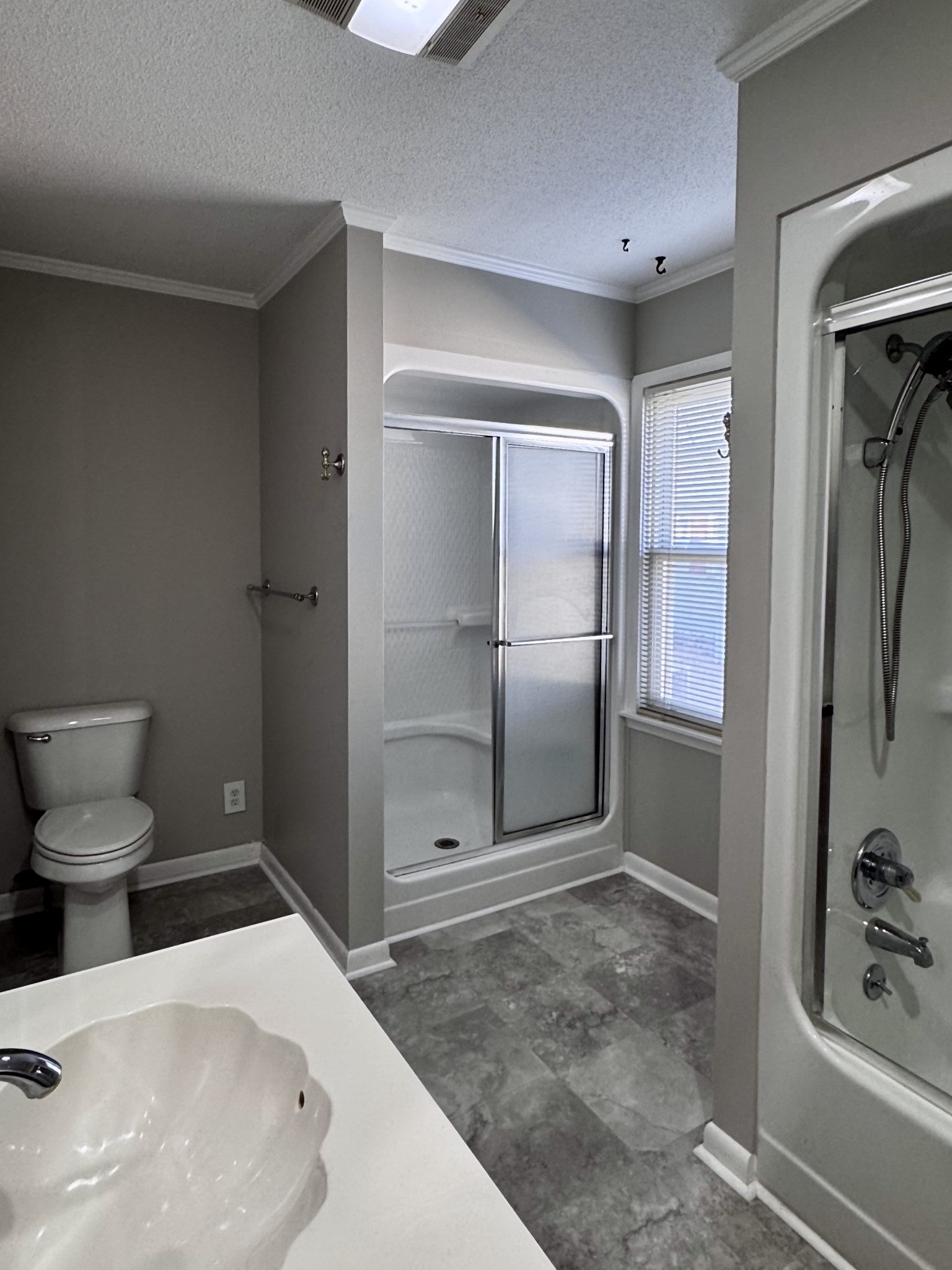 211 Church Street Loretto, TN 38469 - Photo 25 of 37 a bathroom with a tub and a shower