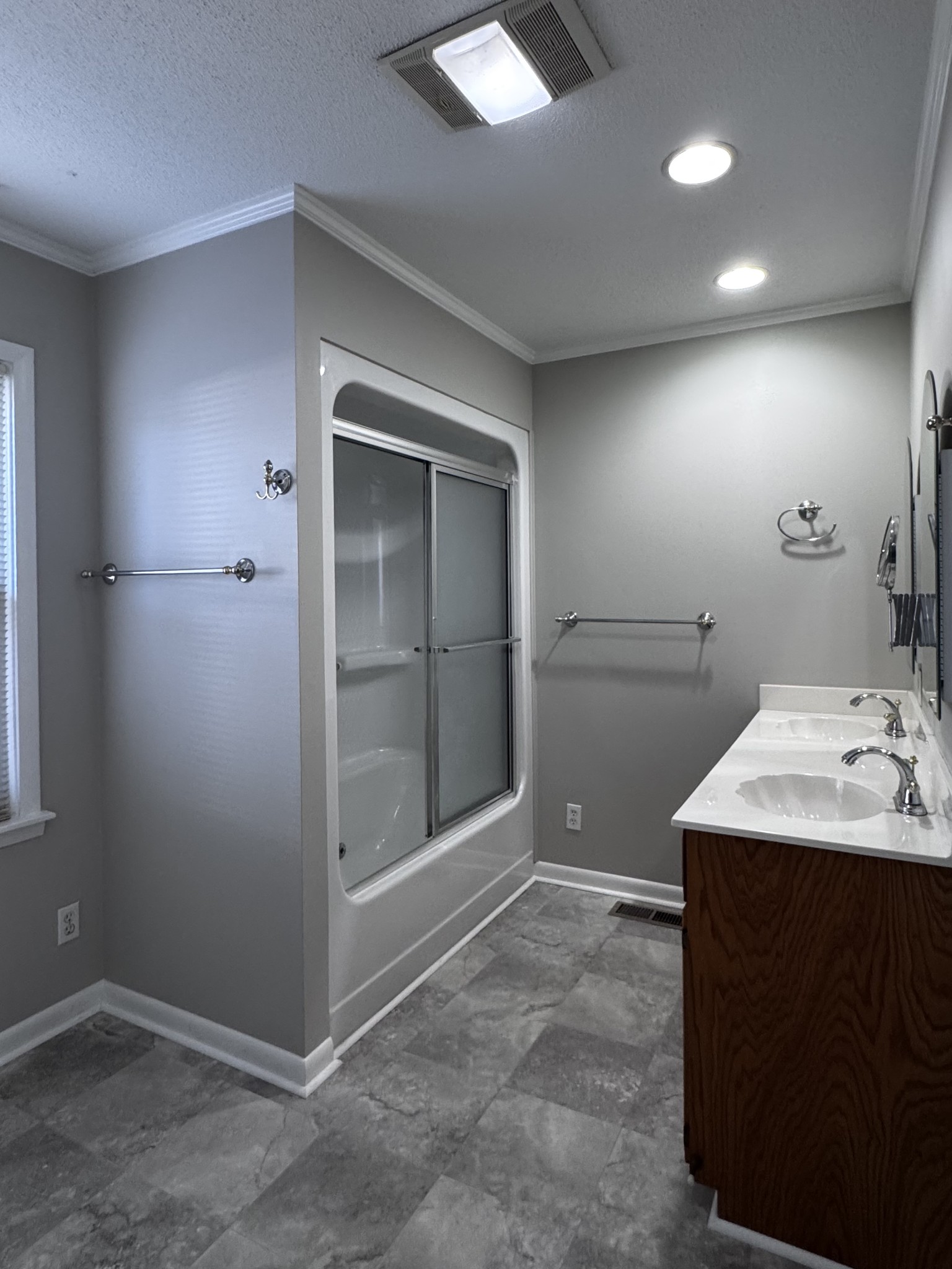 211 Church Street Loretto, TN 38469 - Photo 26 of 37 a bathroom with a sink a toilet and shower