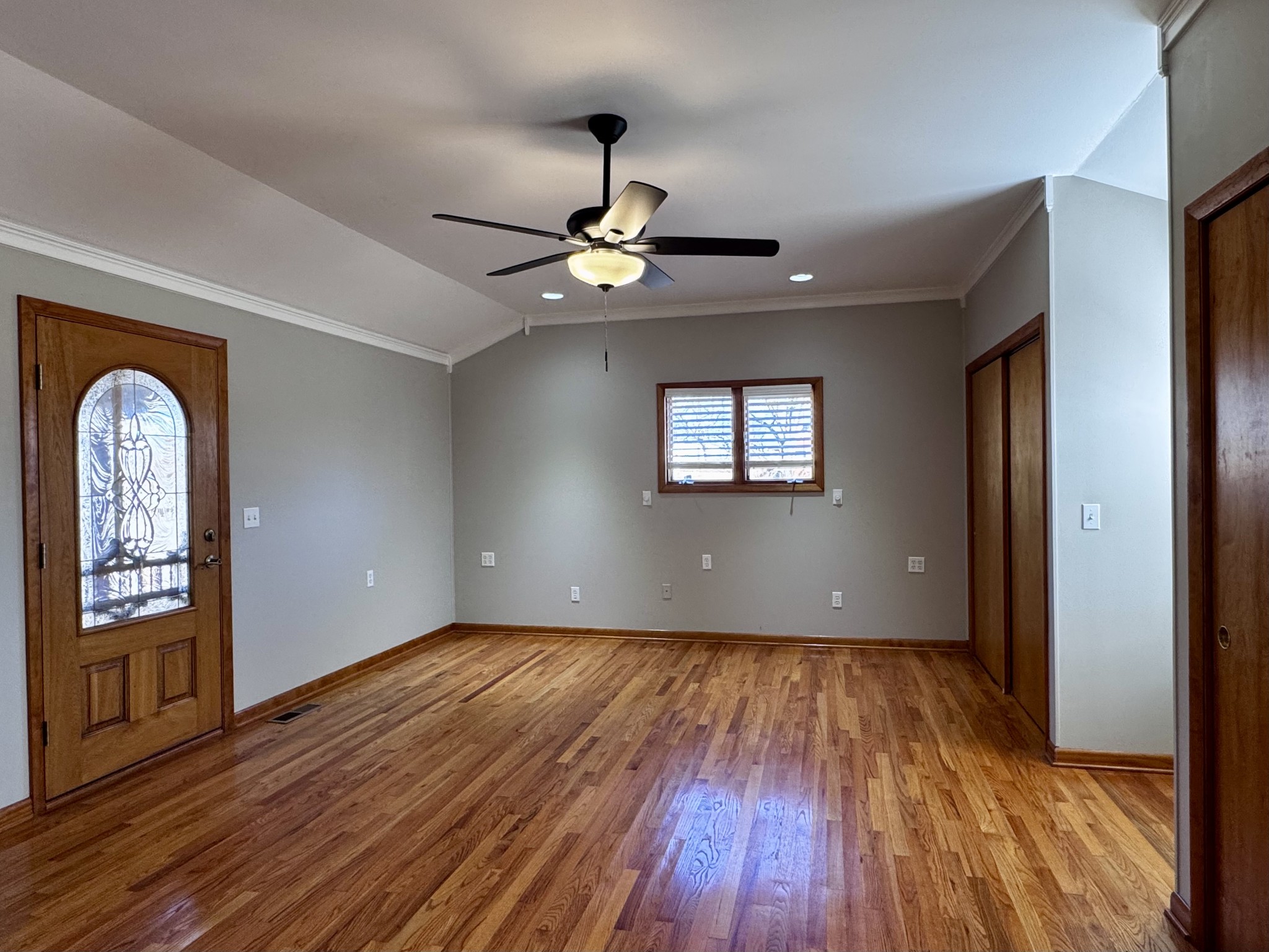 211 Church Street Loretto, TN 38469 - Photo 27 of 37 a view of empty room with wooden floor and chandelier