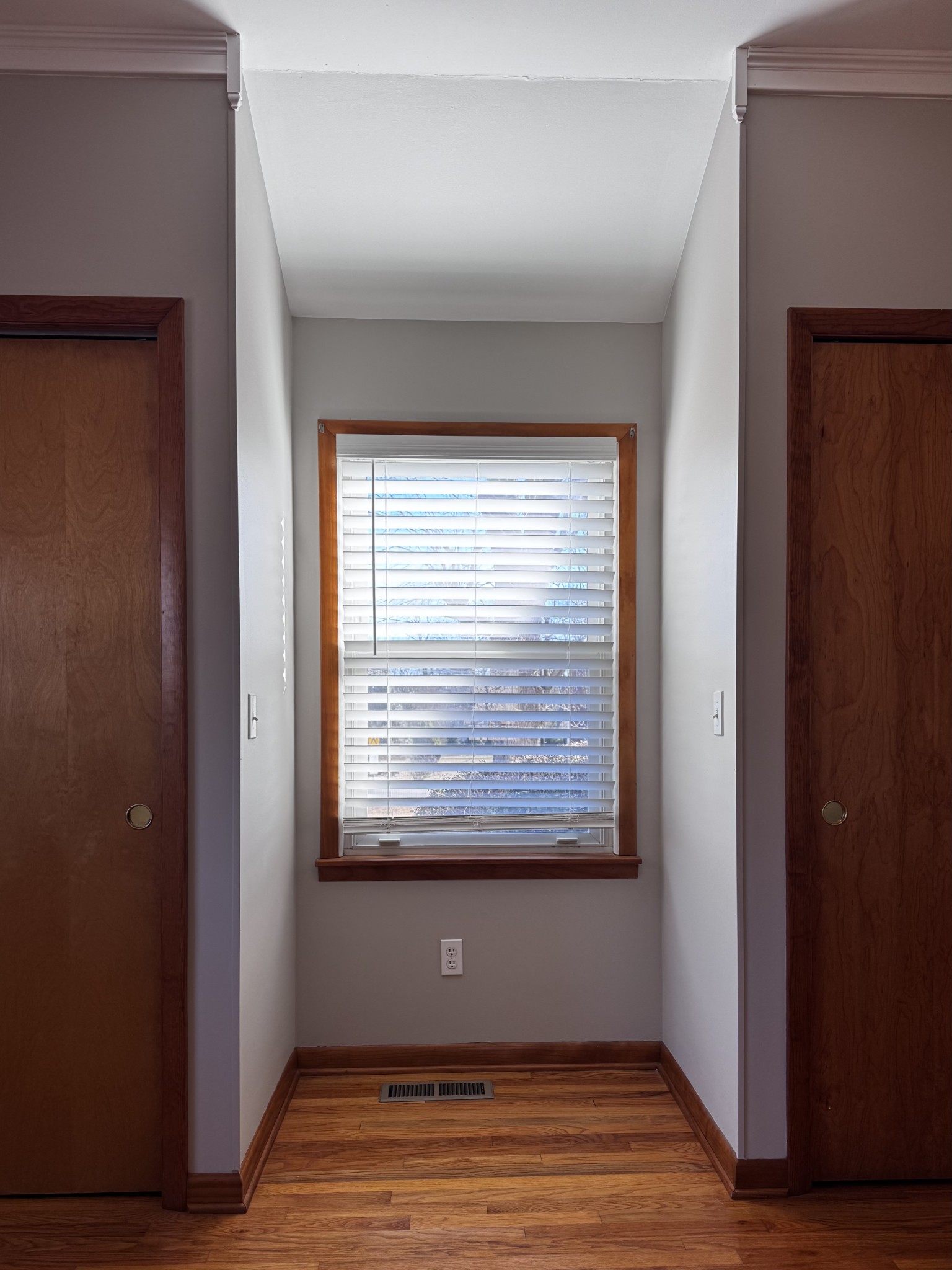 211 Church Street Loretto, TN 38469 - Photo 28 of 37 a view of an empty room with wooden floor and a window
