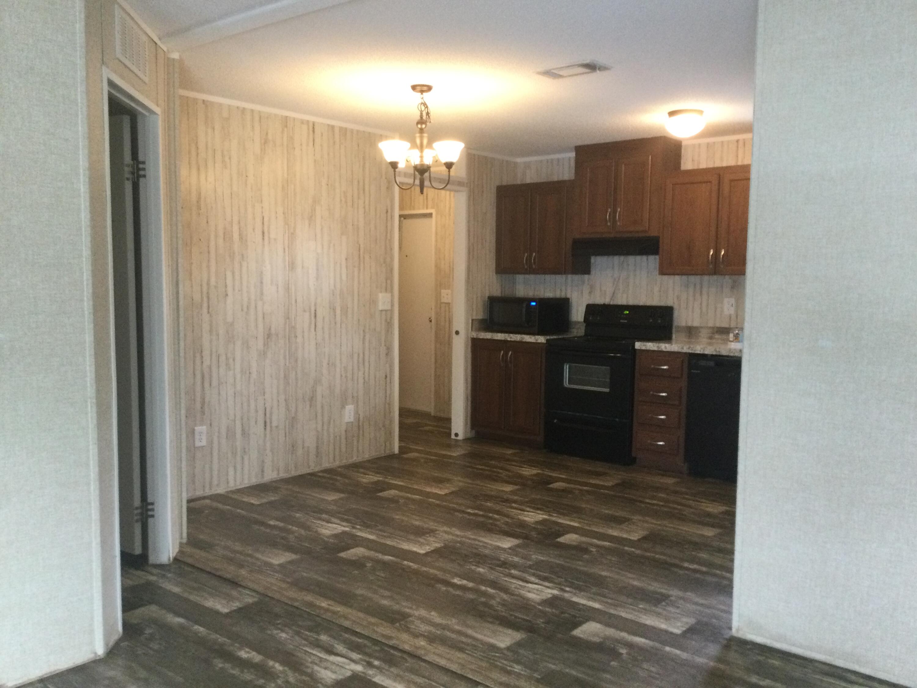 5000 Southeast Federal Highway, Unit 82 Stuart, FL 34997 - Photo 8 of 14 a view of a kitchen with a sink