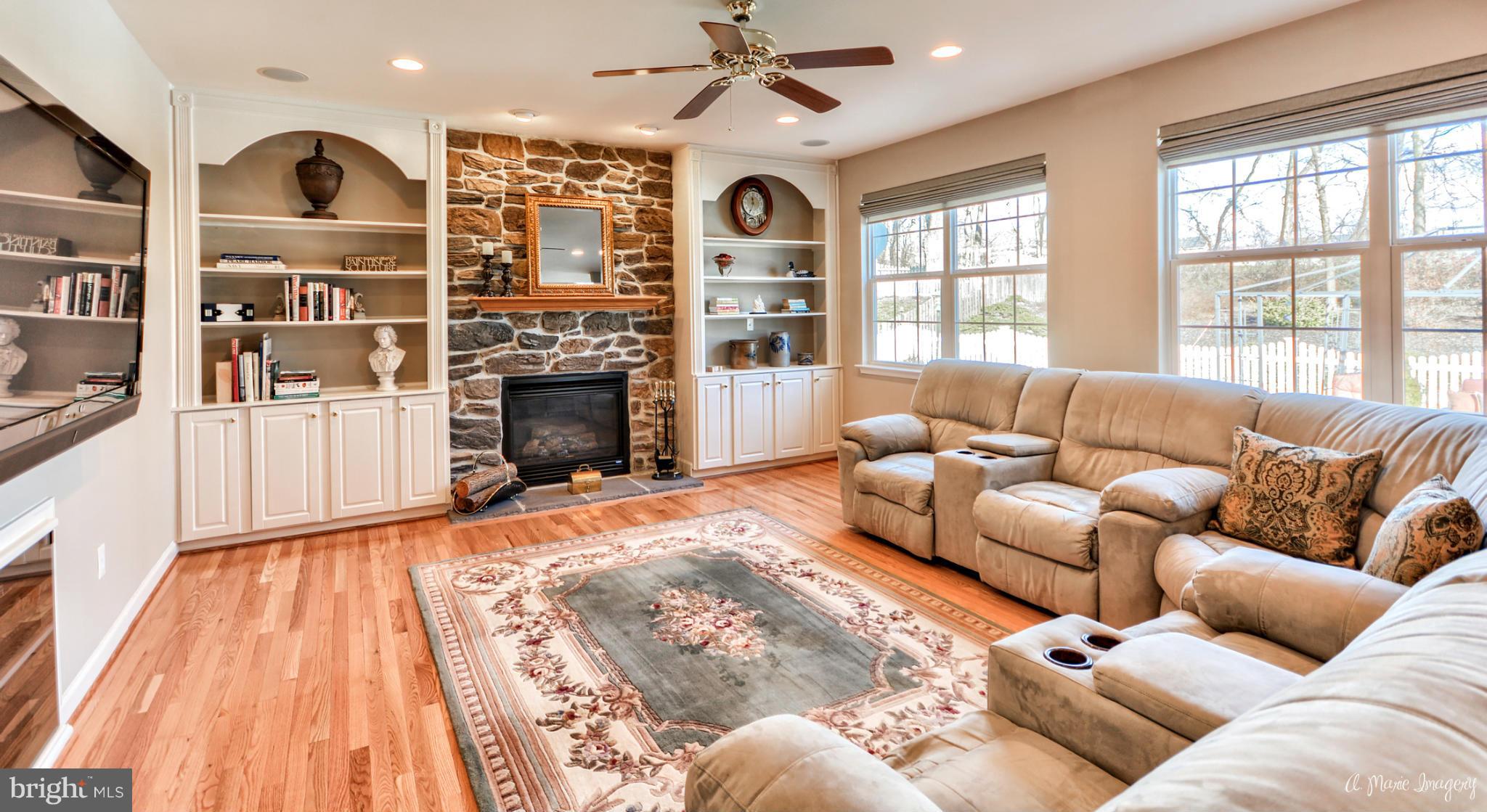 1719 Canal Clipper Court Point of Rocks, MD 21777 - Photo 2 of 30 a living room with fireplace furniture and a wooden floor