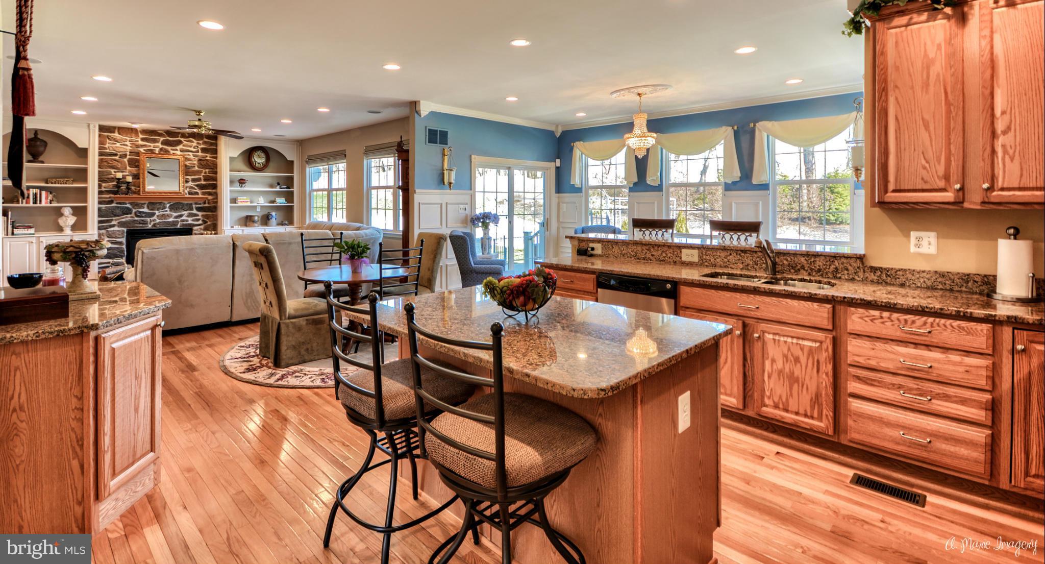 1719 Canal Clipper Court Point of Rocks, MD 21777 - Photo 30 of 30 a kitchen with stainless steel appliances granite countertop table chairs stove and kitchen island