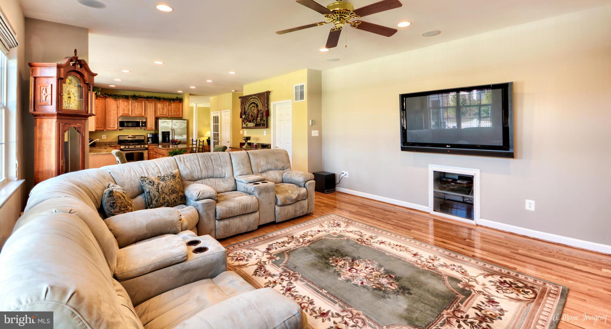 1719 Canal Clipper Court Point of Rocks, MD 21777 - Photo 13 of 30 a living room with furniture and a flat screen tv