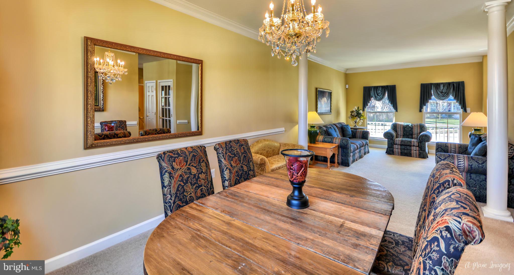 1719 Canal Clipper Court Point of Rocks, MD 21777 - Photo 20 of 30 a living room with furniture and a chandelier