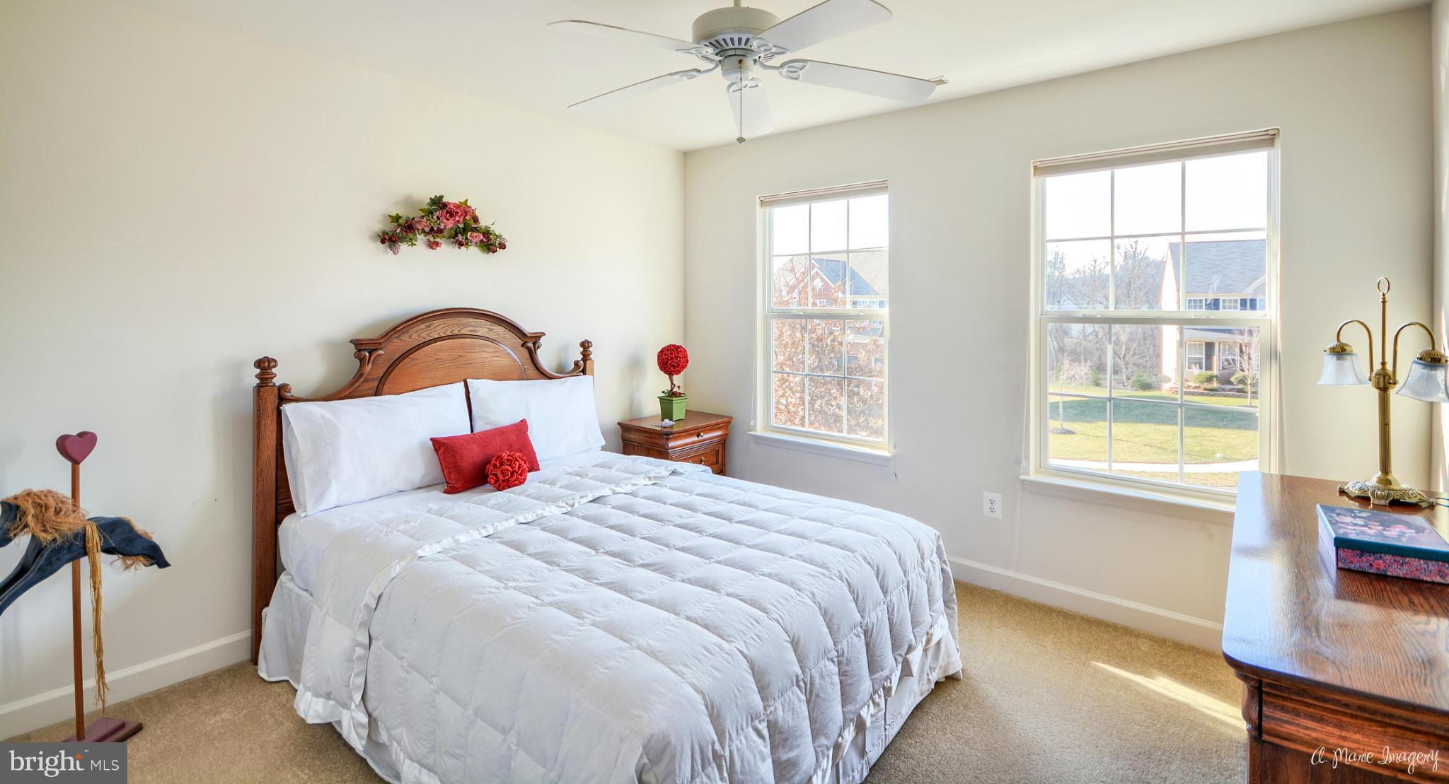 1719 Canal Clipper Court Point of Rocks, MD 21777 - Photo 25 of 30 a bedroom with a bed and a window