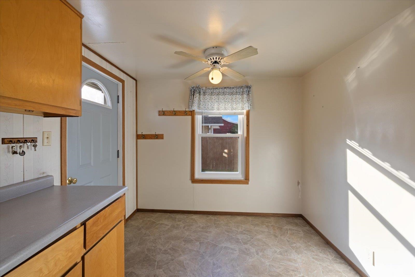 2120 Kelly Avenue Cloquet, MN 55720 - Photo 16 of 38 Unfurnished dining area with healthy amount of natural light and ceiling fan