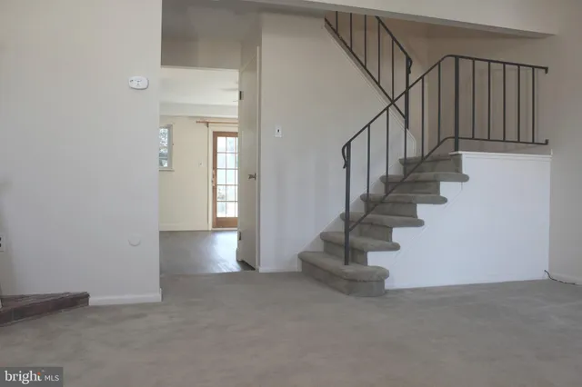 a view of an entryway with stairs