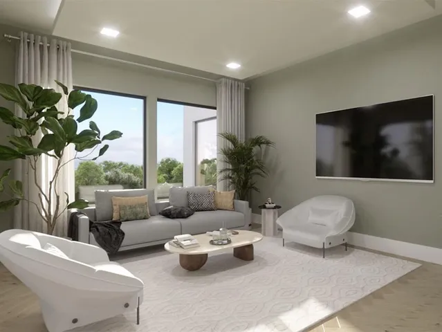 a outdoor room with lots of furniture and potted plants