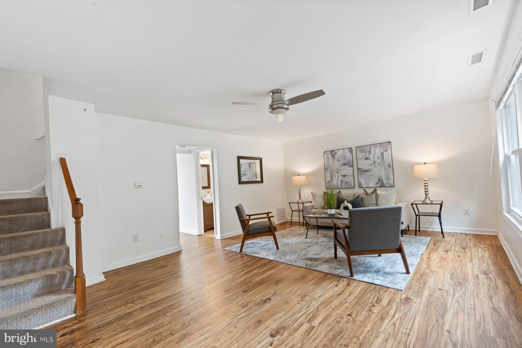 1719 Addison Road South District Heights, MD 20747 - Photo 3 of 22 a living room with furniture and wooden floor