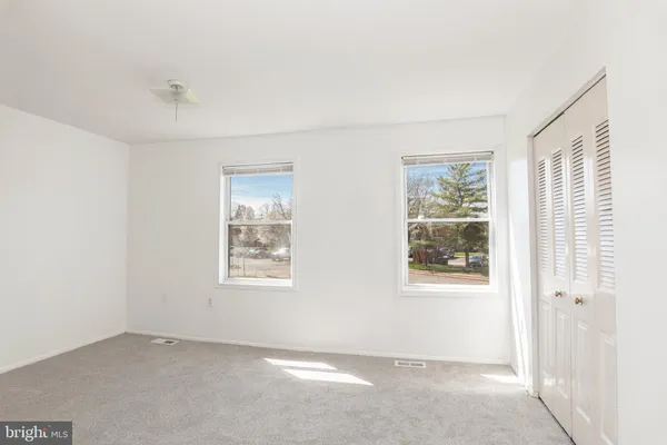 an empty room with windows