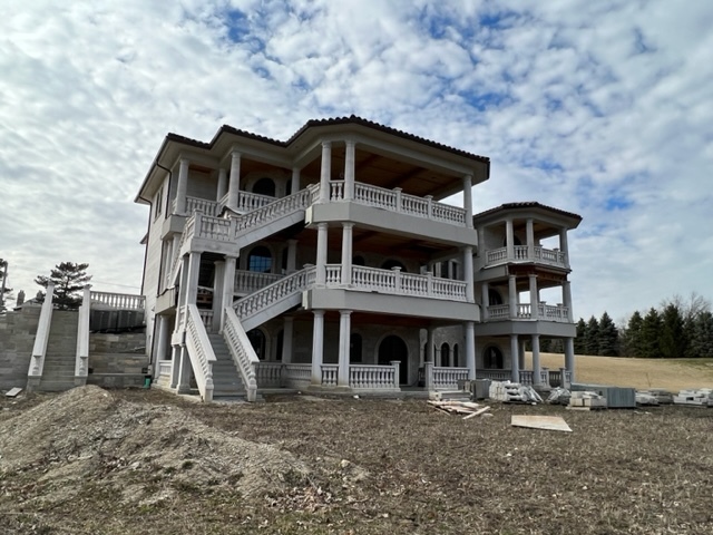 6379 South County Line Road Burr Ridge, IL 60527 - Photo 8 of 8 a large brick building with a clock on it