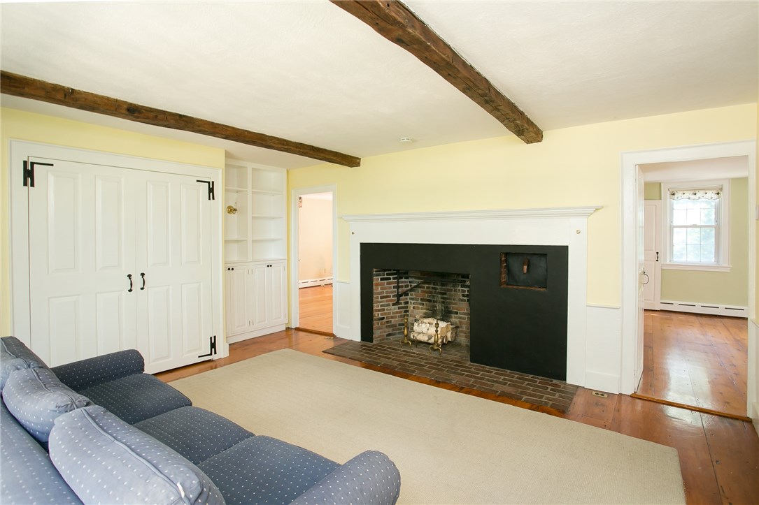 697 Middle Road Portsmouth, RI 02871 - Photo 20 of 38 Second Floor family room has another large fireplace with the 2nd beehive oven.
