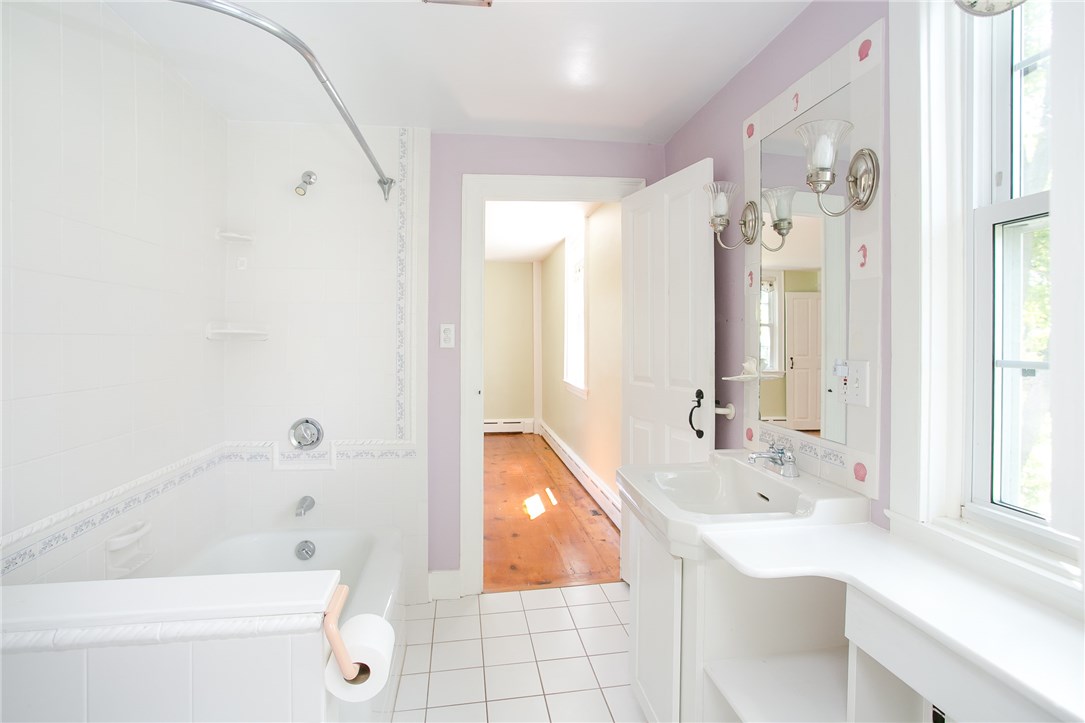 697 Middle Road Portsmouth, RI 02871 - Photo 27 of 38 Bedroom 3 has its own full bath as well.