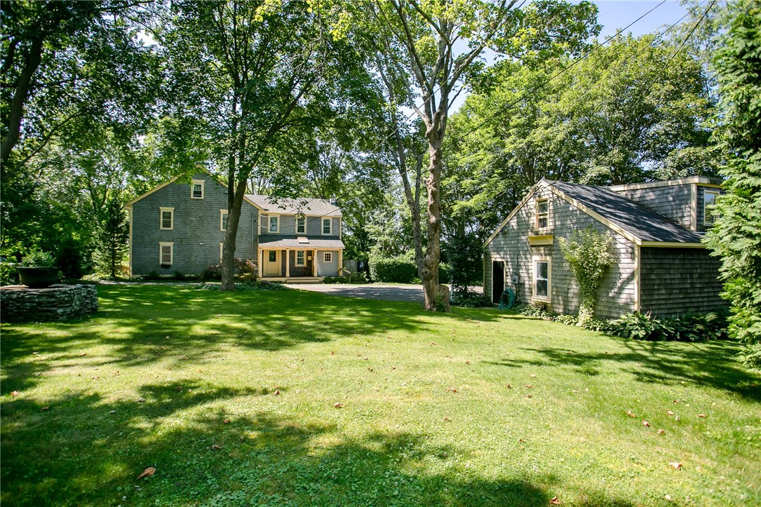 The property is approximately 1.4 acres. A hand dug well, remnants of the original build is at the middle left of the photo. The property has town water.