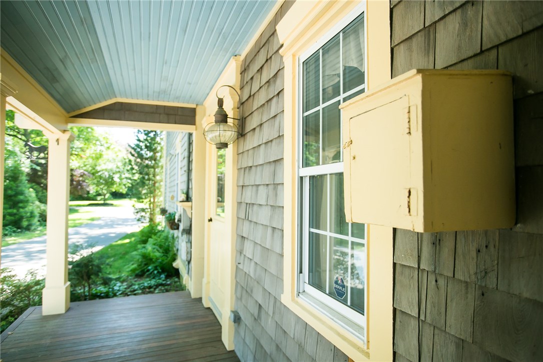 697 Middle Road Portsmouth, RI 02871 - Photo 35 of 38 Back Entrance has a mahogany porch floor