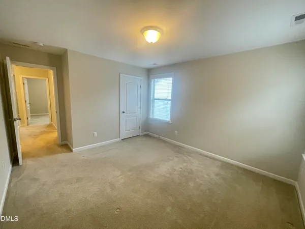 an empty room with a natural light