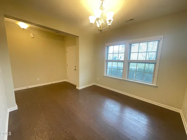 a view of livingroom with hardwood floor and window