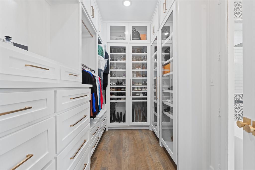 613 Wildcat Way Kennedale, TX 76060 - Photo 21 of 40 a view of walk in closet with empty racks