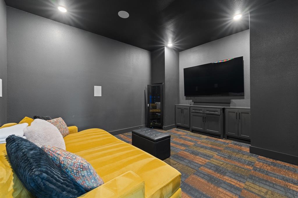 613 Wildcat Way Kennedale, TX 76060 - Photo 27 of 40 a bedroom with a bed and a flat screen tv