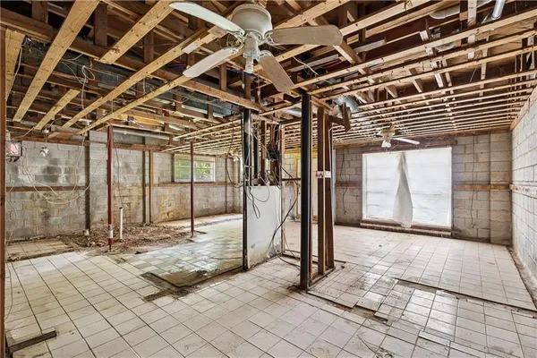 a view of a room with wooden walls