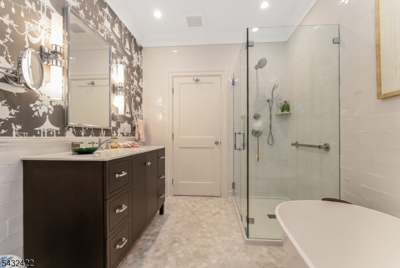 11 New Street Mendham, NJ 07945 - Photo 19 of 35 a bathroom with a tub sink shower and mirror