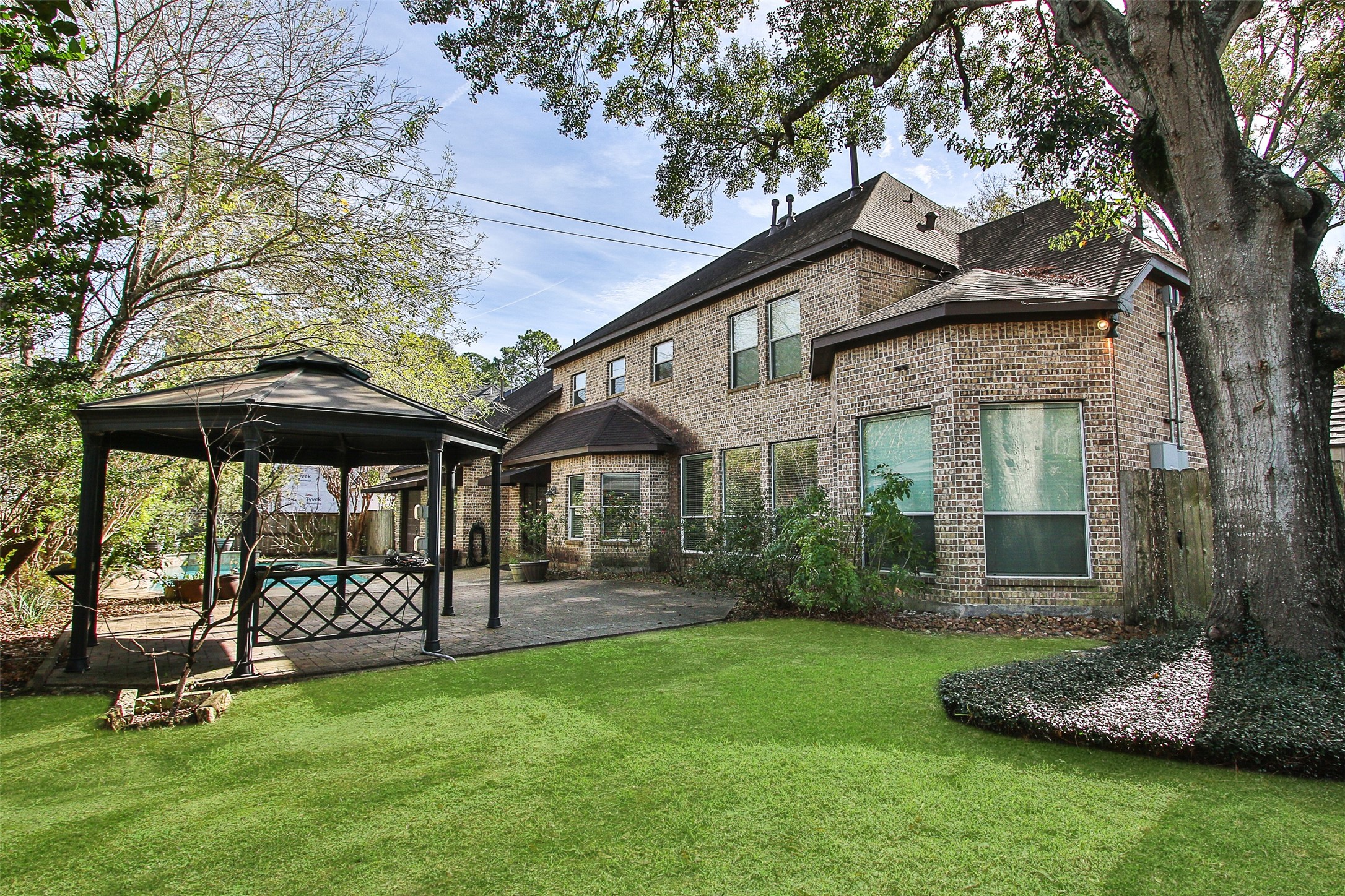 11722 Spriggs Way Houston, TX 77024 - Photo 42 of 49 Fantastic outdoor back yard with gazebo, pool and additional yard space
