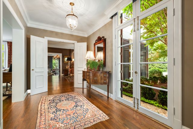 a kitchen with a sink stove and microwave