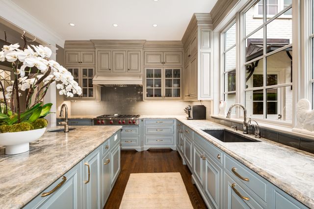 a view of a patio with couches and potted plants