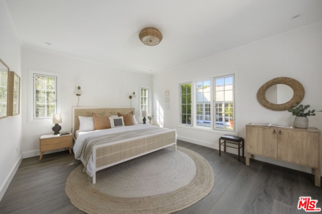 6607 Moore Drive Los Angeles, CA 90048 - Photo 17 of 42 a bed room with a bed and a window