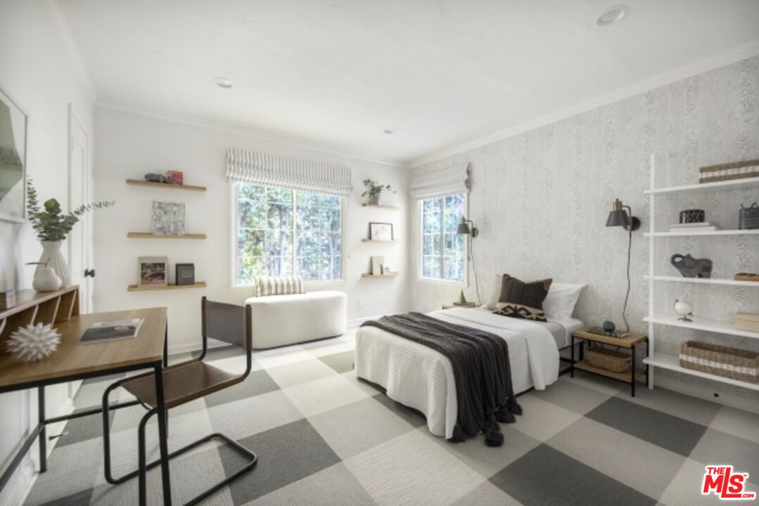 6607 Moore Drive Los Angeles, CA 90048 - Photo 26 of 42 a bedroom with a bed and a desk