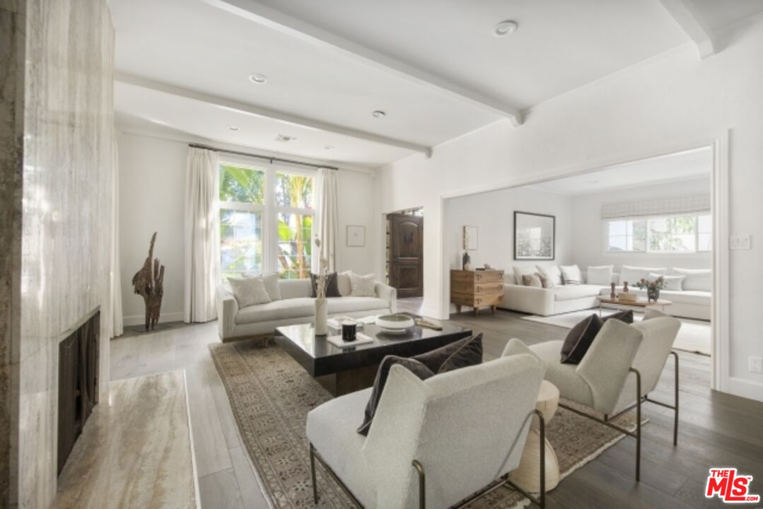 6607 Moore Drive Los Angeles, CA 90048 - Photo 7 of 42 a living room with furniture and a large window