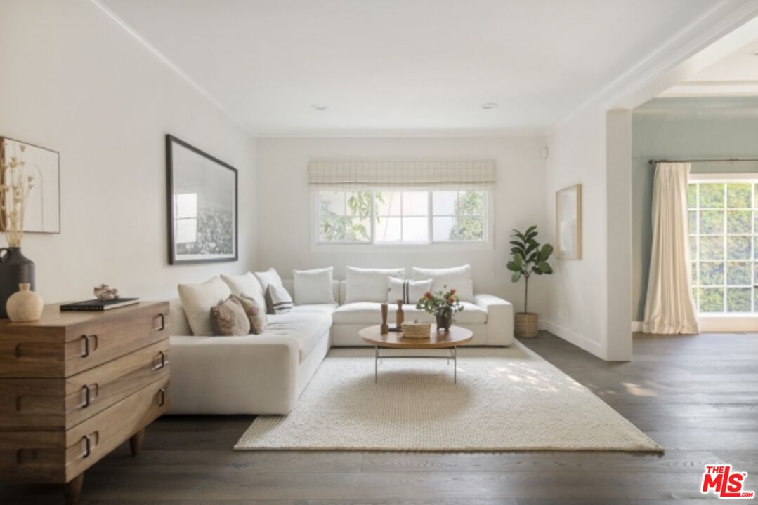 6607 Moore Drive Los Angeles, CA 90048 - Photo 8 of 42 a living room with furniture and wooden floor
